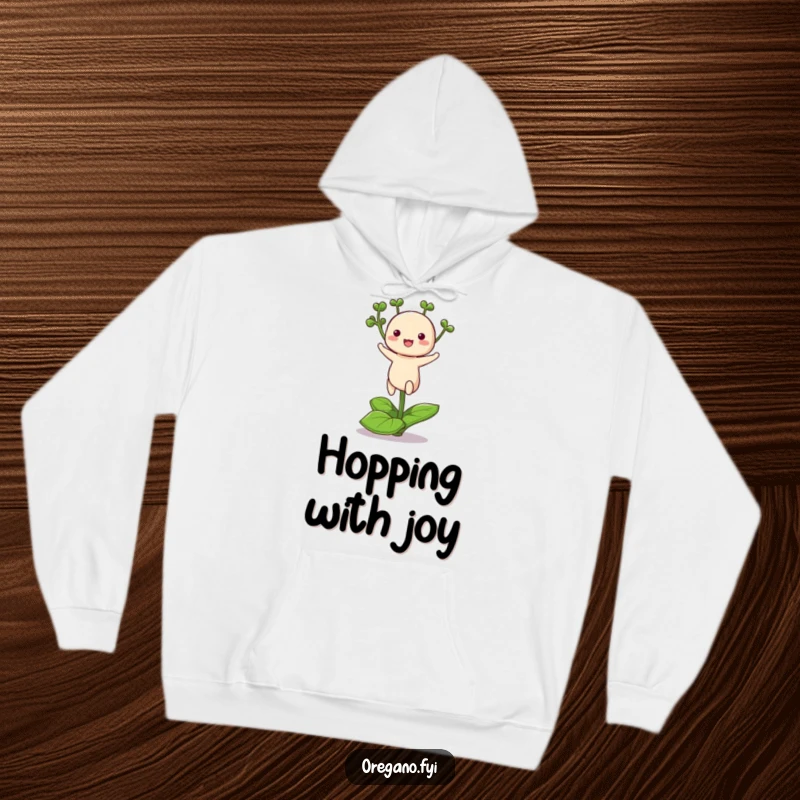Funny hoodie showcasing a charming kawaii oregano herb energetically hopping on a single leaf, embodying playful cuteness.