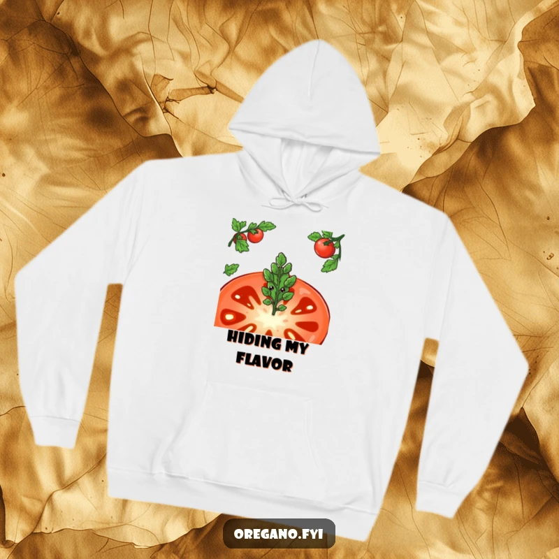 Funny hoodie featuring a shy oregano leaf character peeking from behind a massive tomato slice, radiating sweetness and introversion.