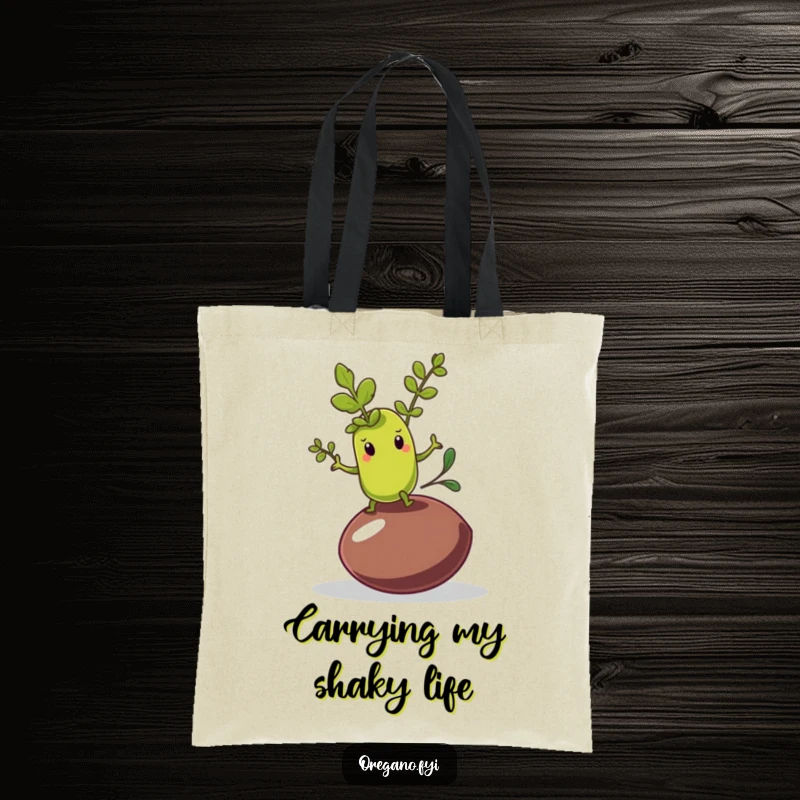 Funny tote bag featuring an oregano leaf character struggling to balance on a wobbly olive pit, a comedic accessory.